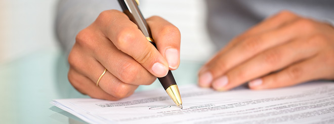 A person signing a document